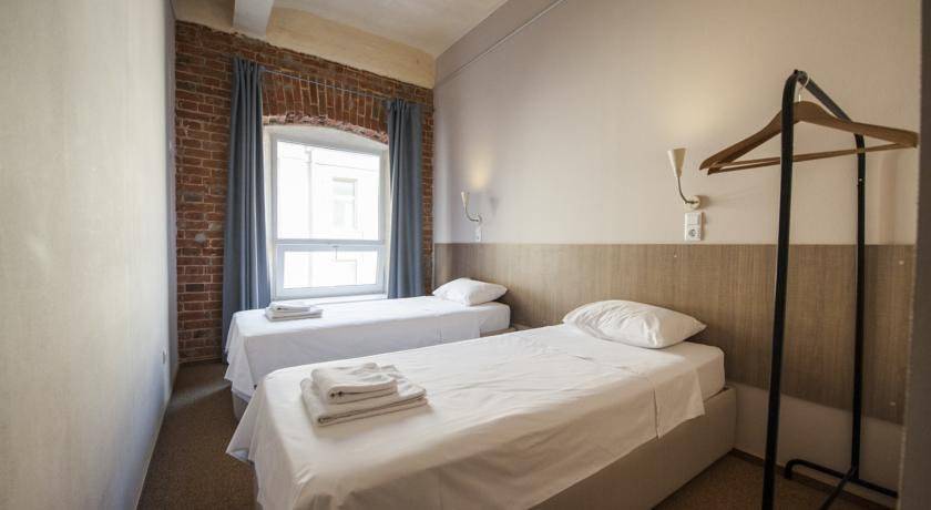 Фотографии номера Двухместный номер с 1 кроватью или 2 отдельными кроватями и общей ванной комнатой в Гостинице Лофт Отель Набоков Ростов-на-Дону