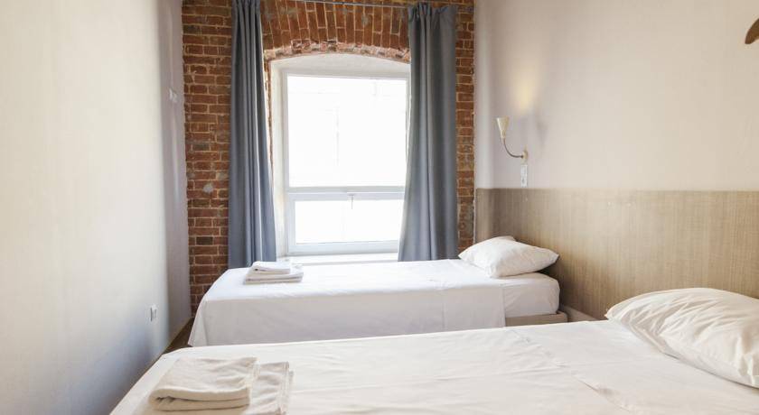 Фотографии номера Двухместный номер с 1 кроватью или 2 отдельными кроватями и общей ванной комнатой в Гостинице Лофт Отель Набоков Ростов-на-Дону